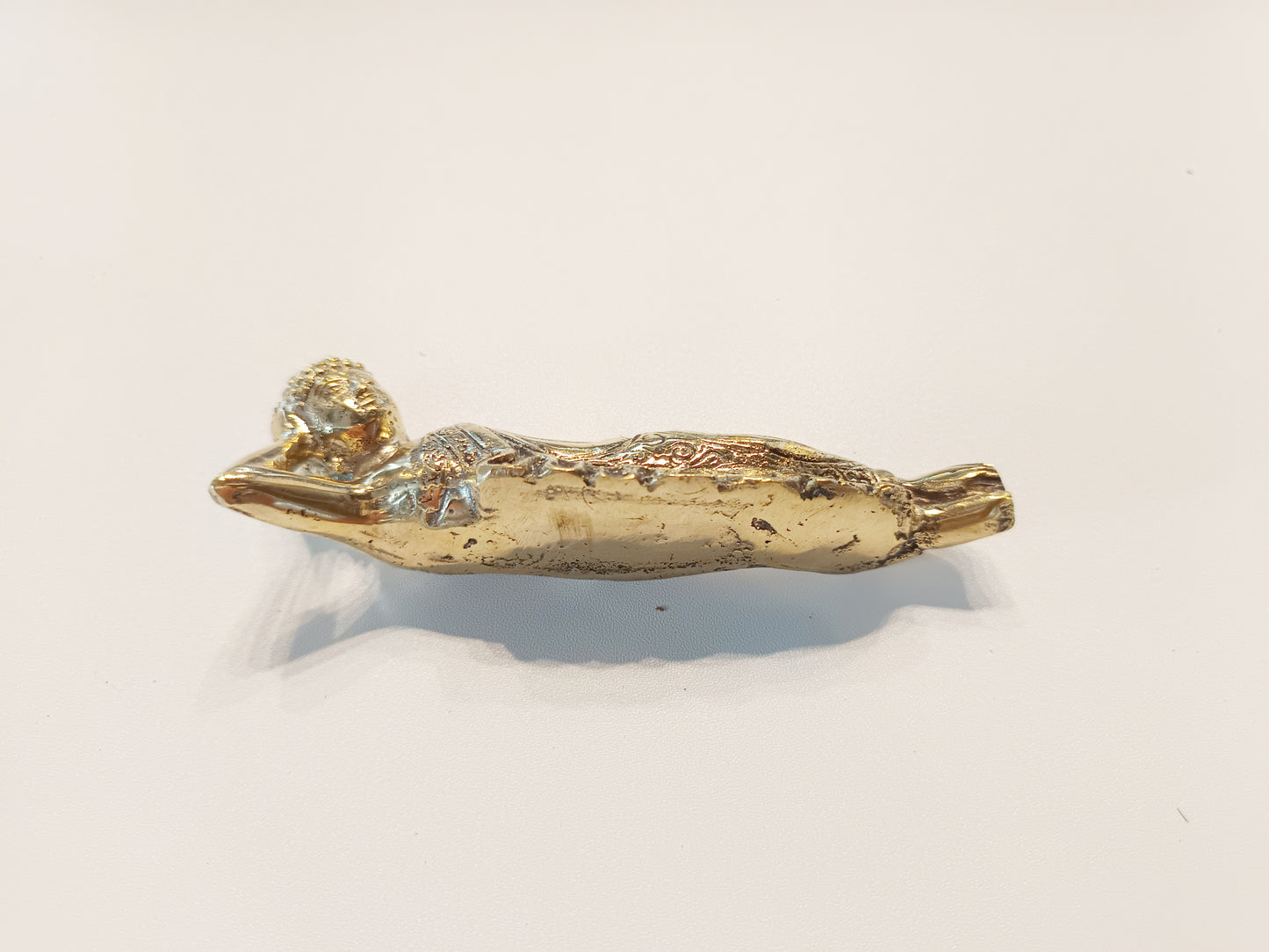 Sleeping Buddha brass figurine, antique brass relaxing Buddha miniature.
