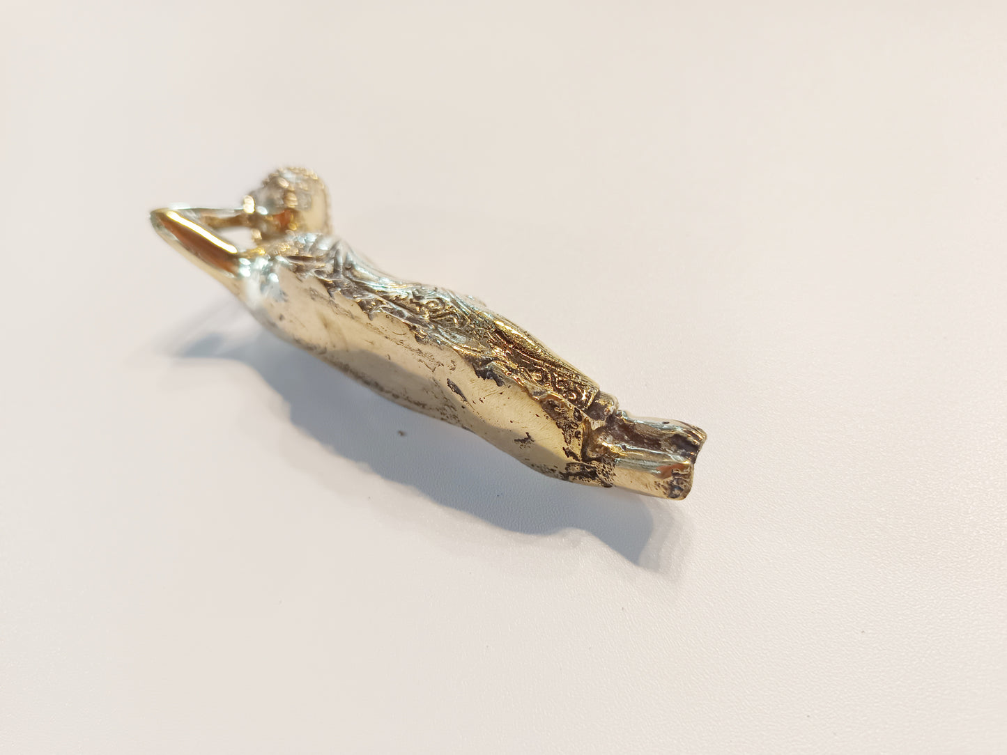Sleeping Buddha brass figurine, antique brass relaxing Buddha miniature.