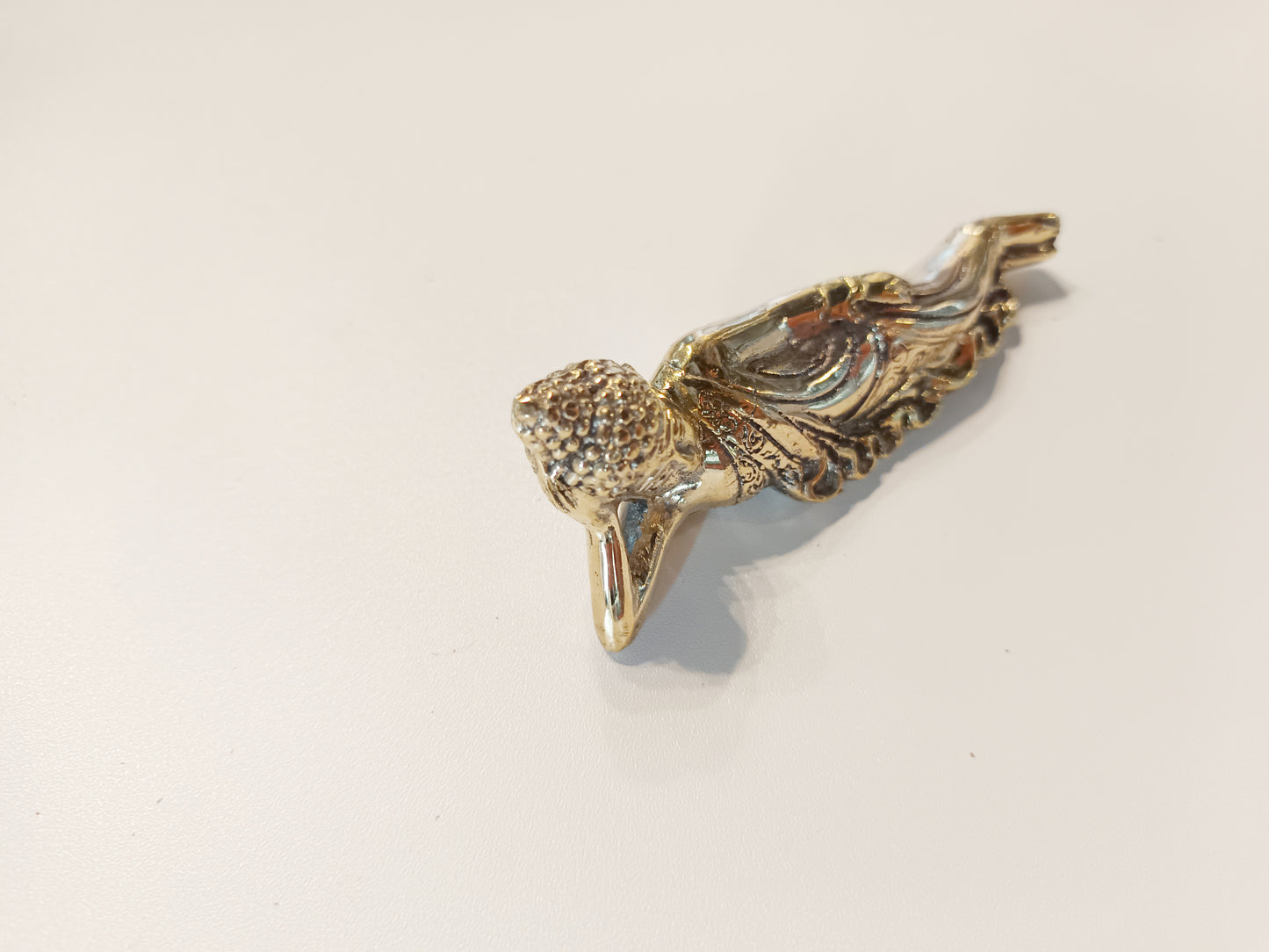 Sleeping Buddha brass figurine, antique brass relaxing Buddha miniature.