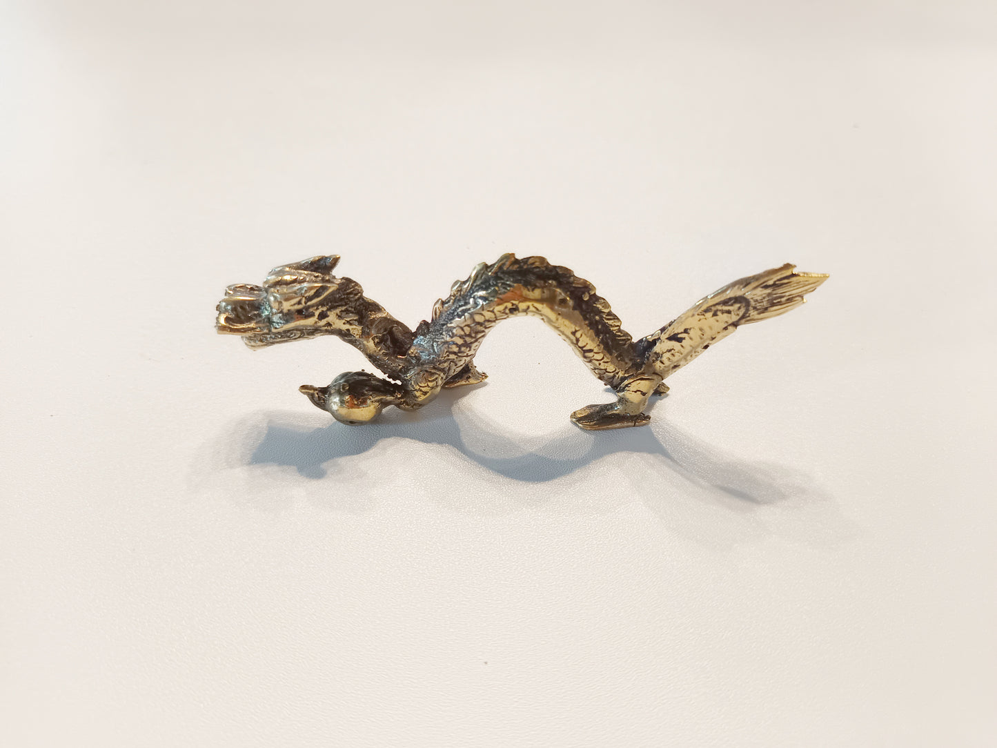 Dragon brass figurine, antique brass eastern dragon miniature.