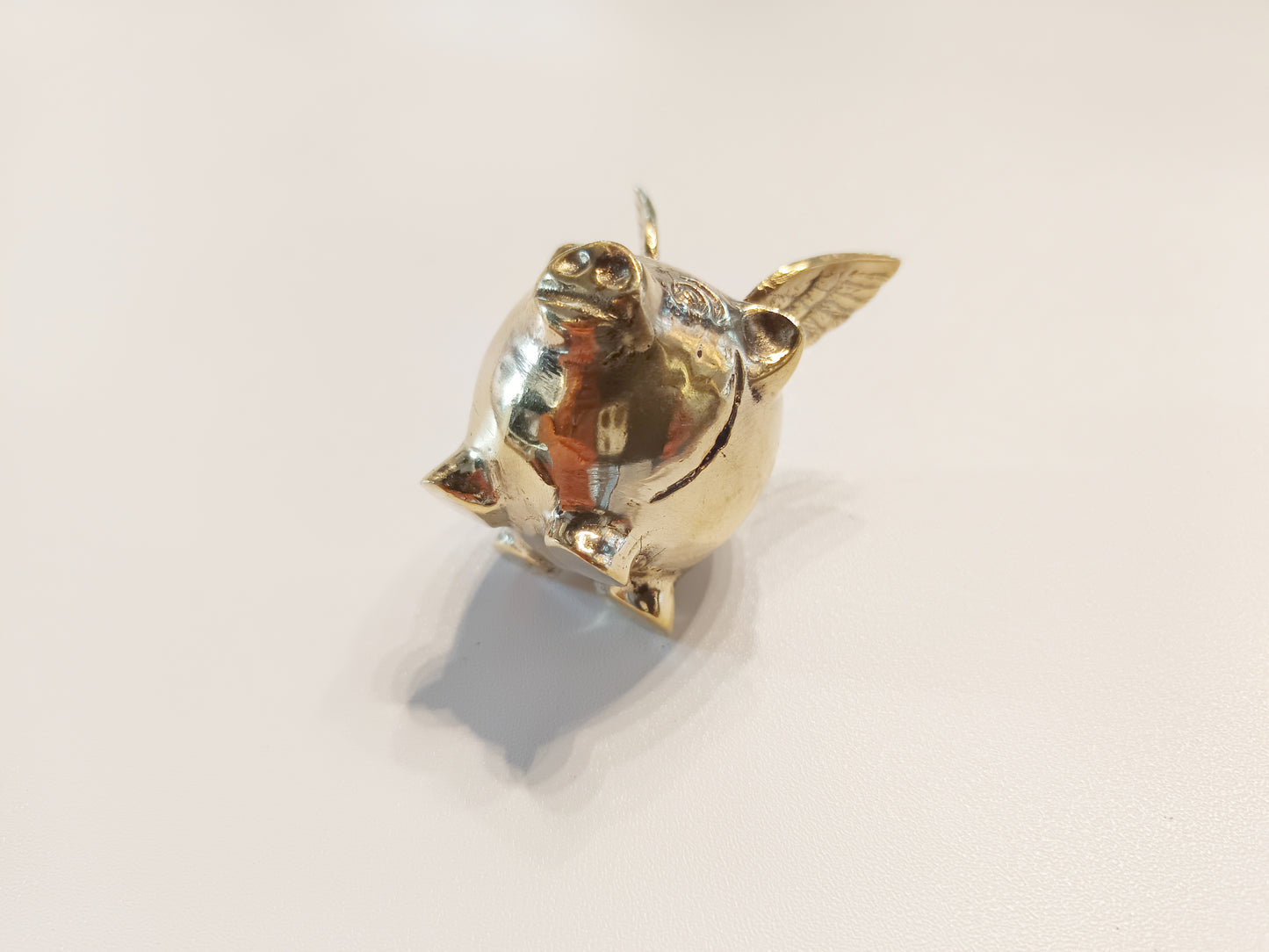 Flying pig brass figurine, antique brass winged pig miniature.