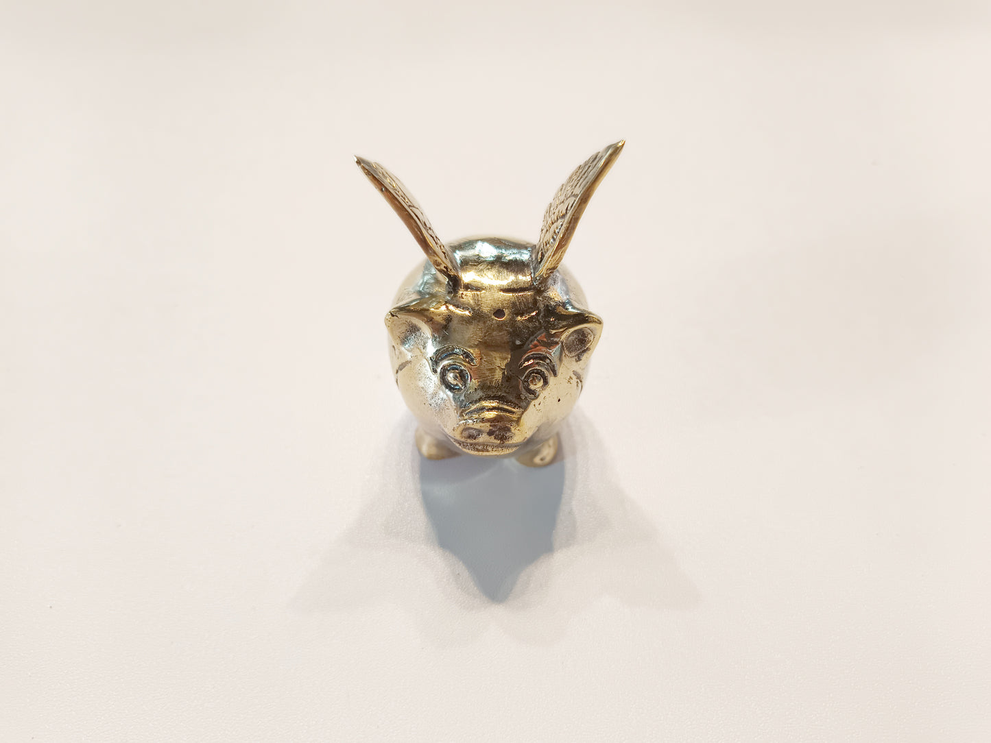 Flying pig brass figurine, antique brass winged pig miniature.