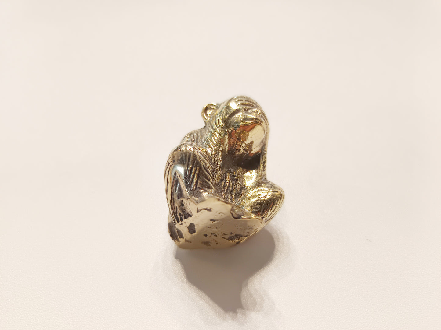 Covering eyes monkey brass figurine, antique brass speak no evil ape miniature.