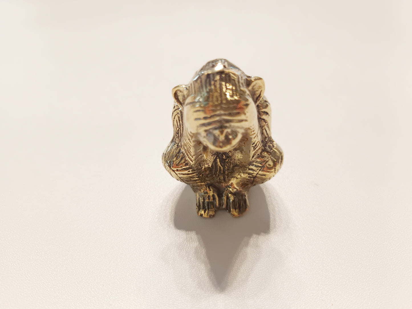 Covering eyes monkey brass figurine, antique brass speak no evil ape miniature.