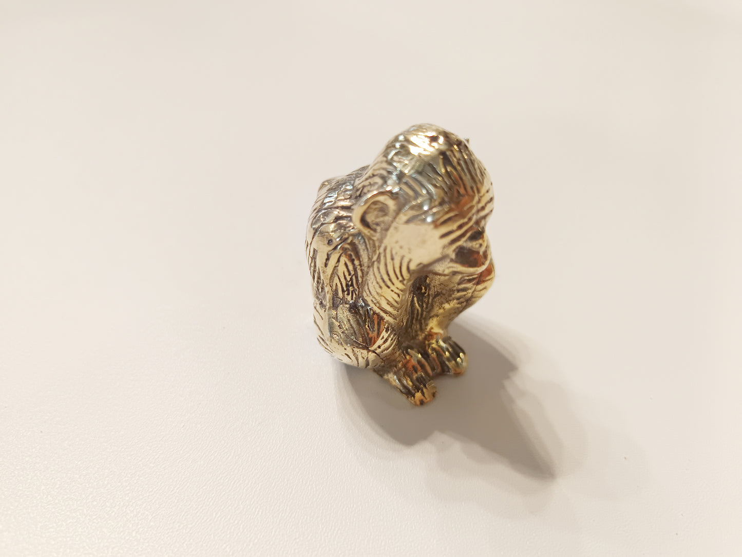 Covering eyes monkey brass figurine, antique brass speak no evil ape miniature.