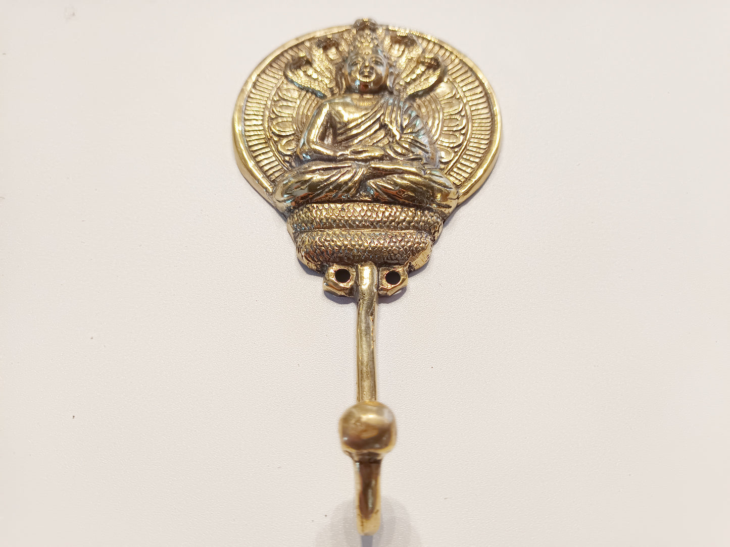 Round meditating Buddha brass wall hook, antique brass round Buddha with serpent coat rack.