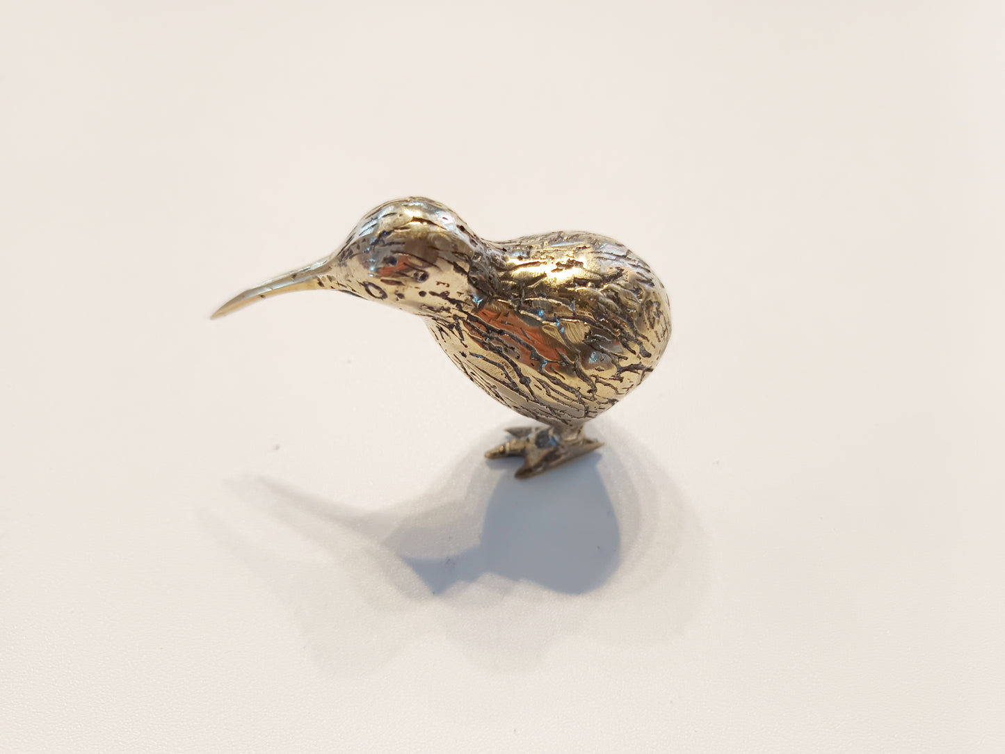 Kiwi bird brass figurine, antique brass extinct bird miniature.