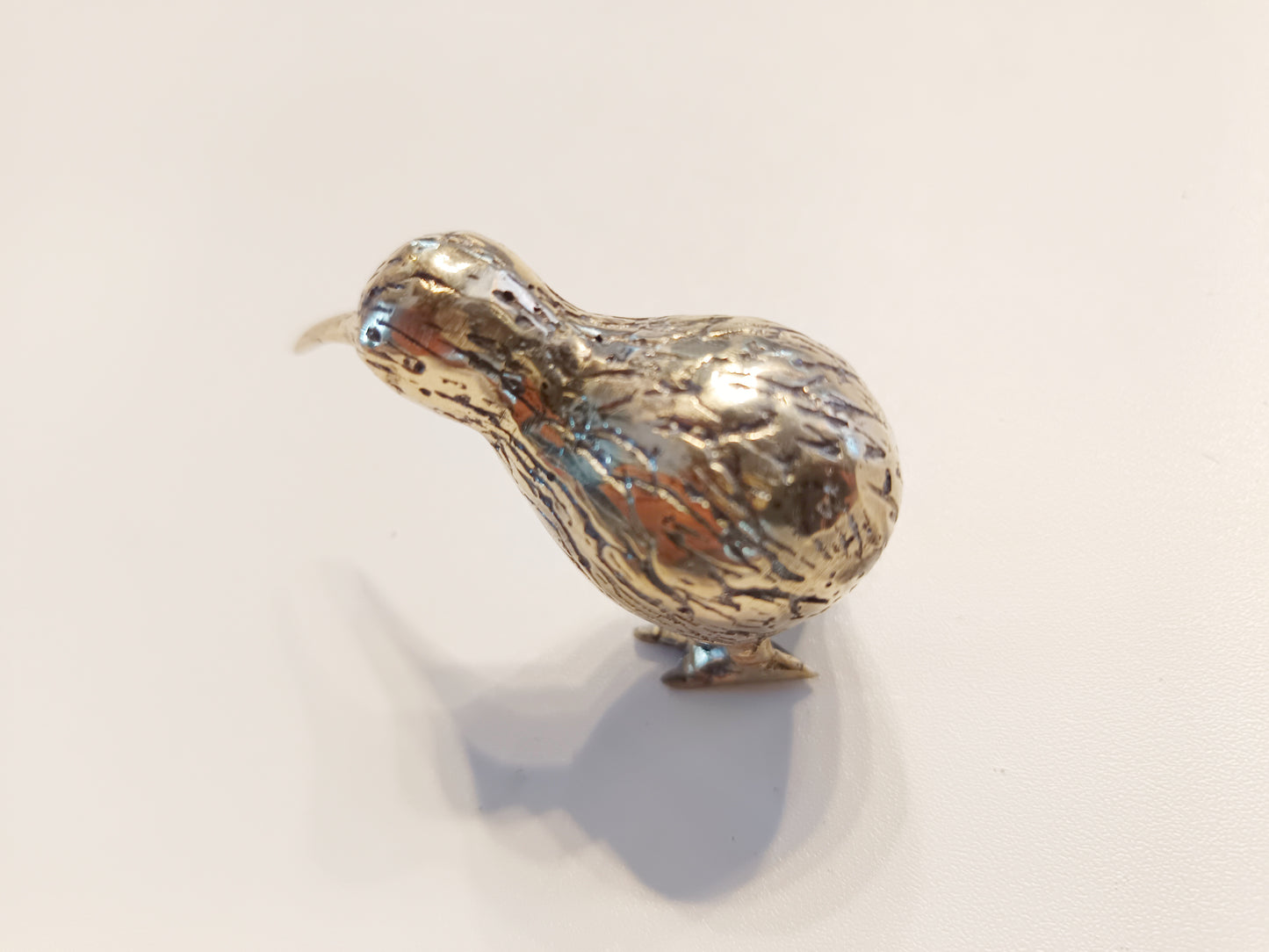 Kiwi bird brass figurine, antique brass extinct bird miniature.