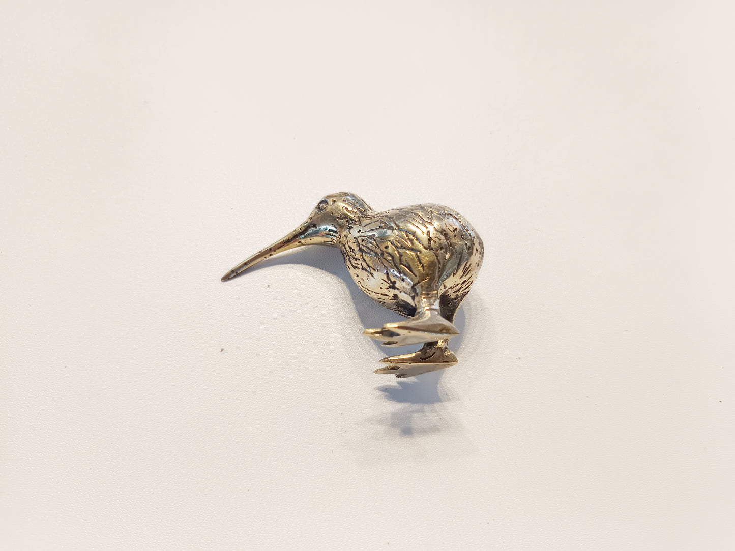 Kiwi bird brass figurine, antique brass extinct bird miniature.