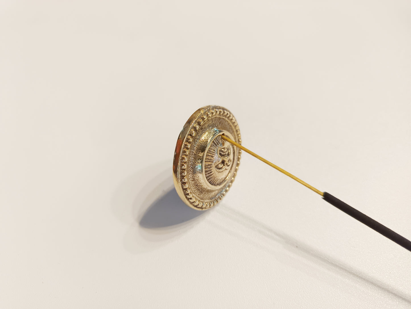 Brass small Aztec face incense stick holder, set of 2