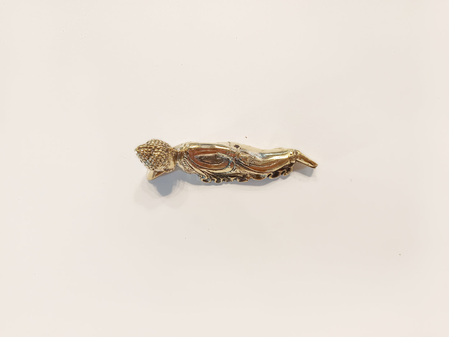 Sleeping Buddha brass figurine, antique brass relaxing Buddha miniature.