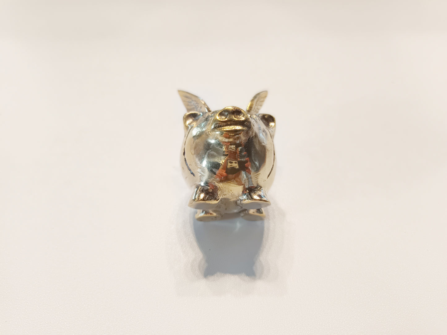 Flying pig brass figurine, antique brass winged pig miniature.