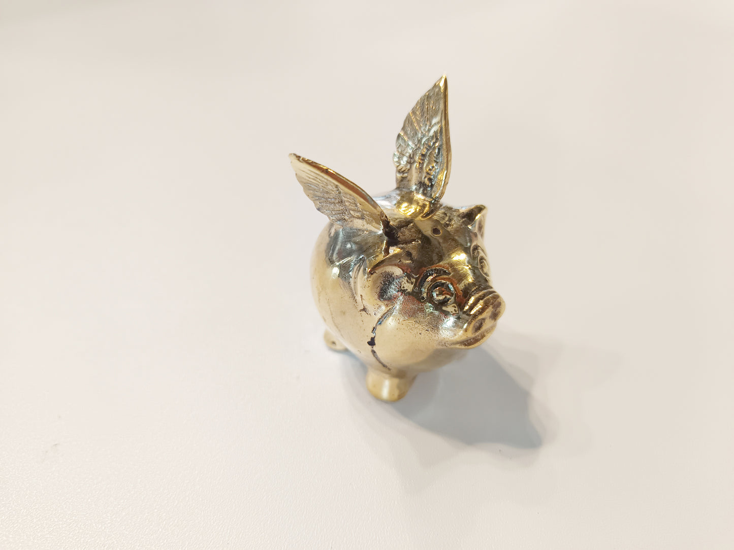 Flying pig brass figurine, antique brass winged pig miniature.
