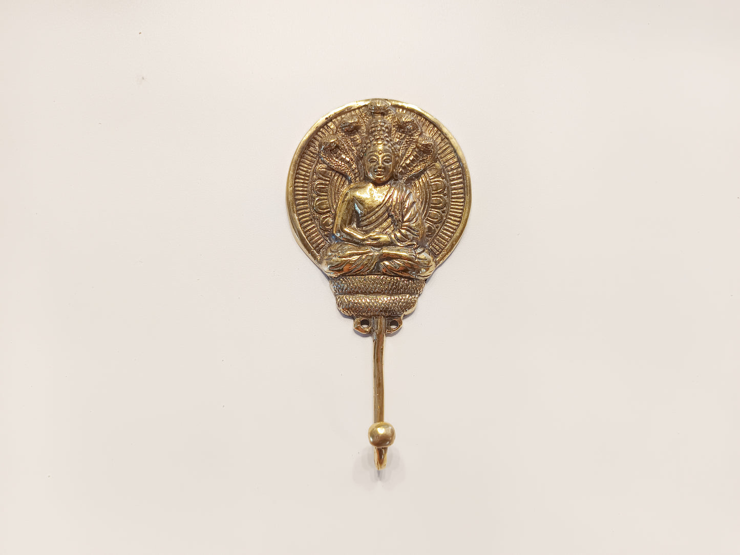 Round meditating Buddha brass wall hook, antique brass round Buddha with serpent coat rack.