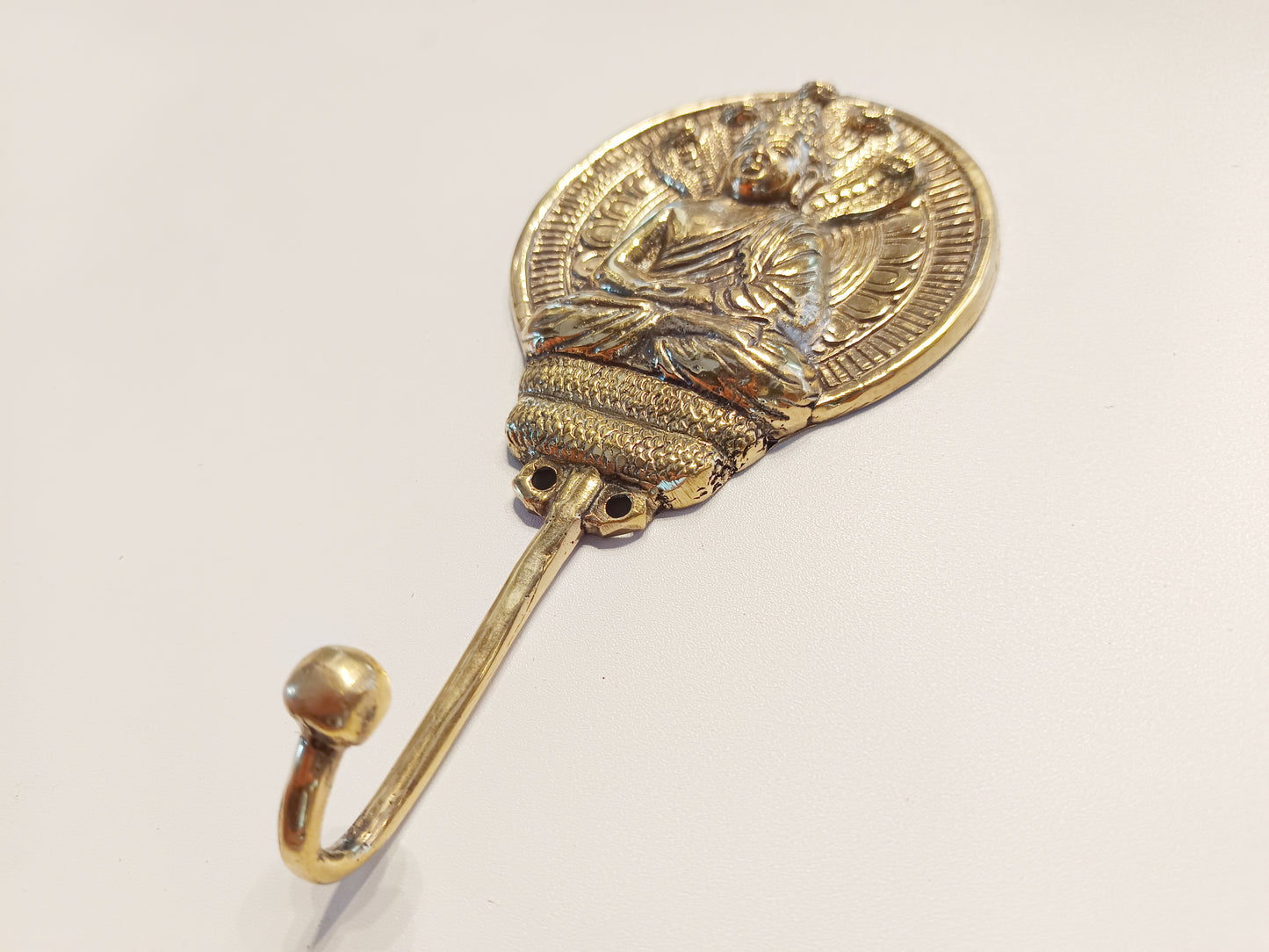 Round meditating Buddha brass wall hook, antique brass round Buddha with serpent coat rack.